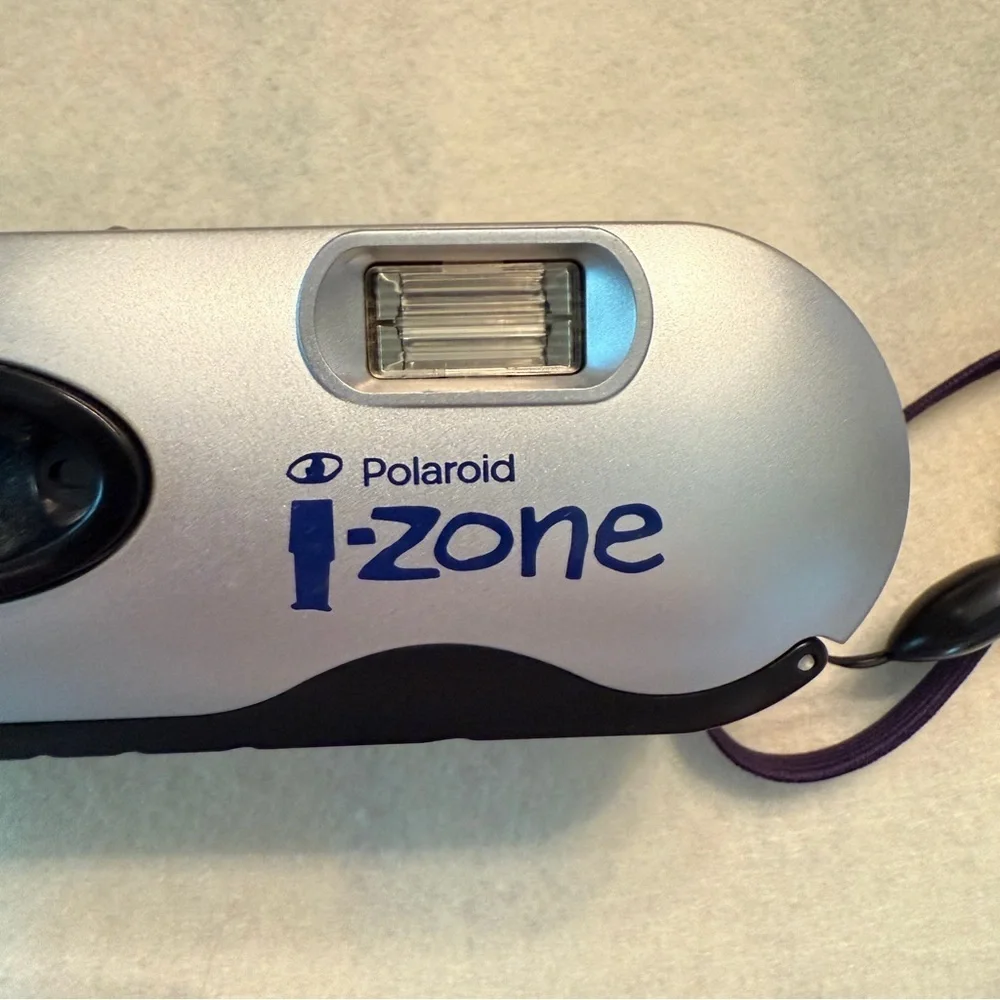 Polaroid i-Zone Silver and Black Camera with Purple Strap